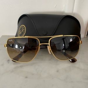 Ray Ban Sunglasses.